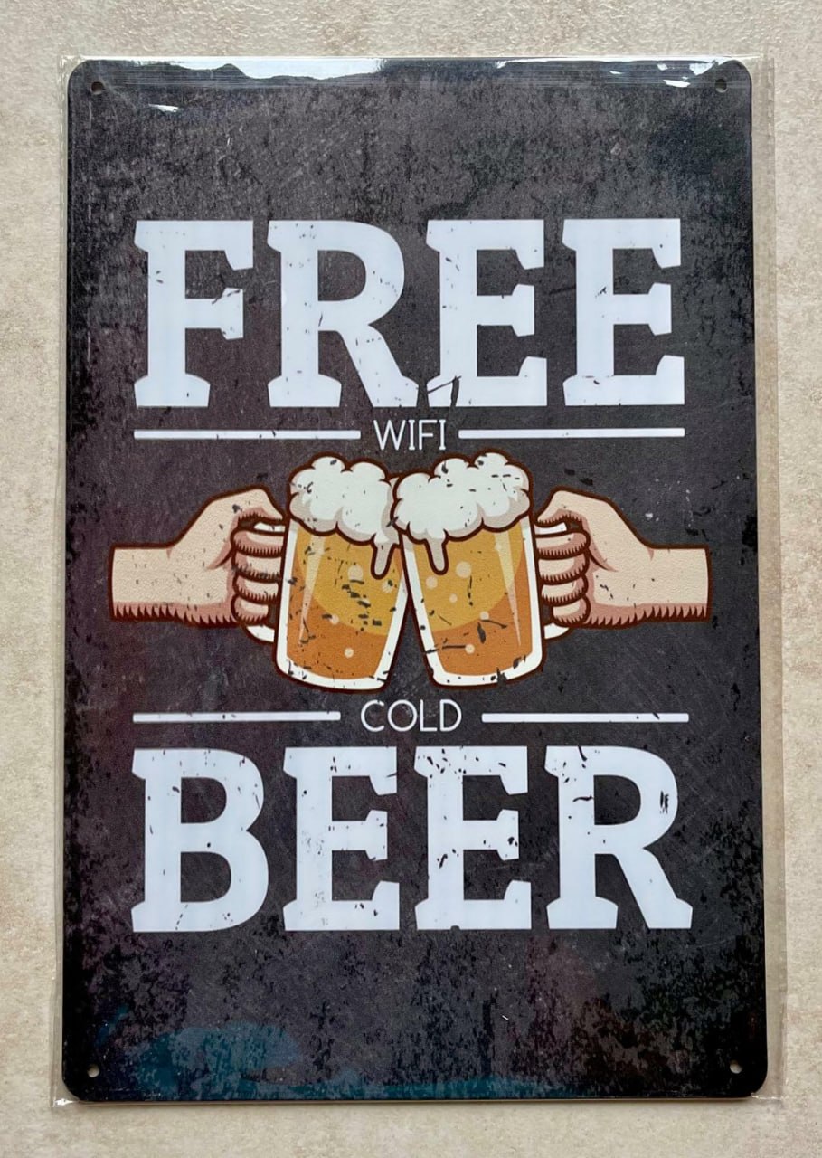 Decorative sign advertising Free WiFi and Cold Beer